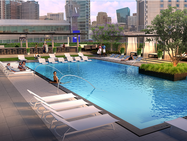 People enjoying the rooftop swimming pool