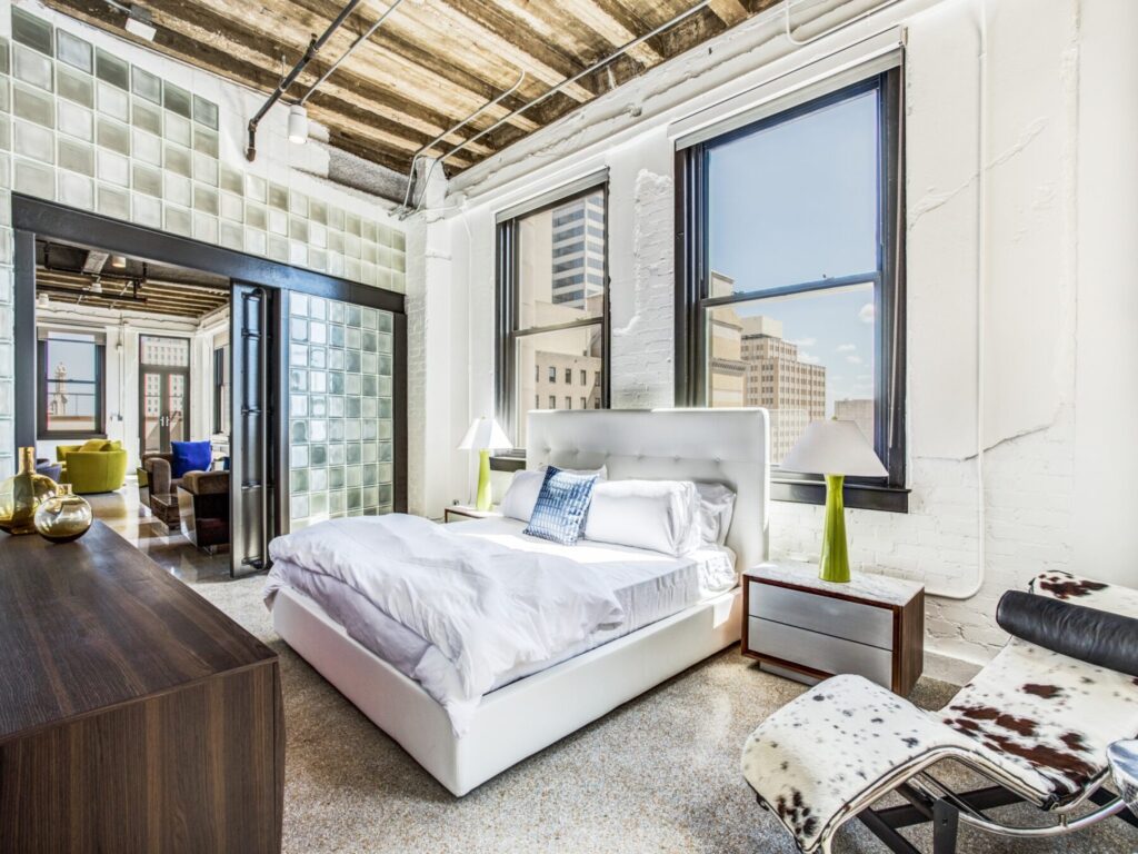 Downtown Dallas loft with floor-to-ceiling windows at The Drakestone